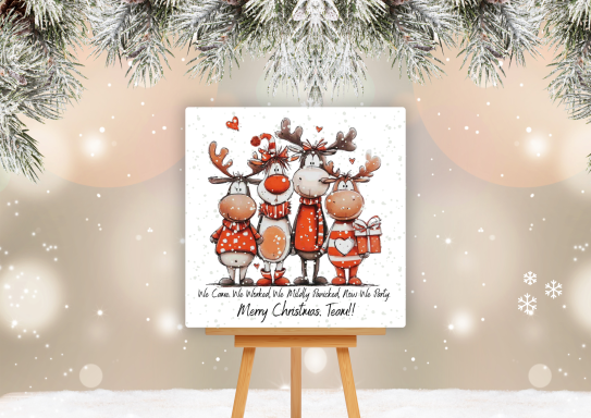 Christmas Card For Your Work Crew Four festive reindeer in red outfits with hearts and a "Merry Christmas" sign.